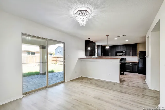 a view of a kitchen with a sink