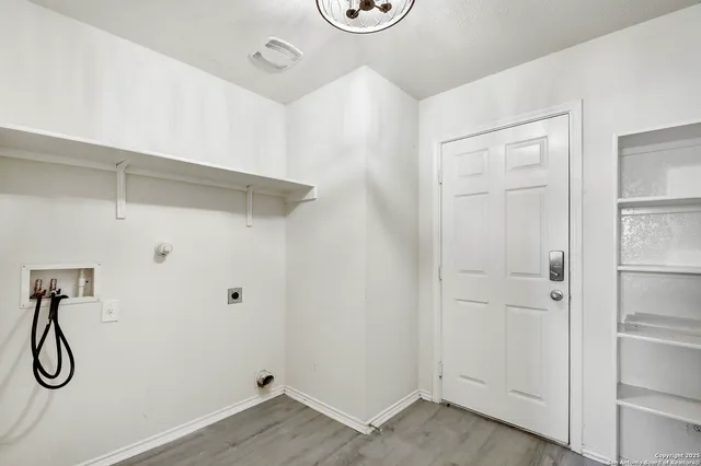 a view of a room with rack on the wall