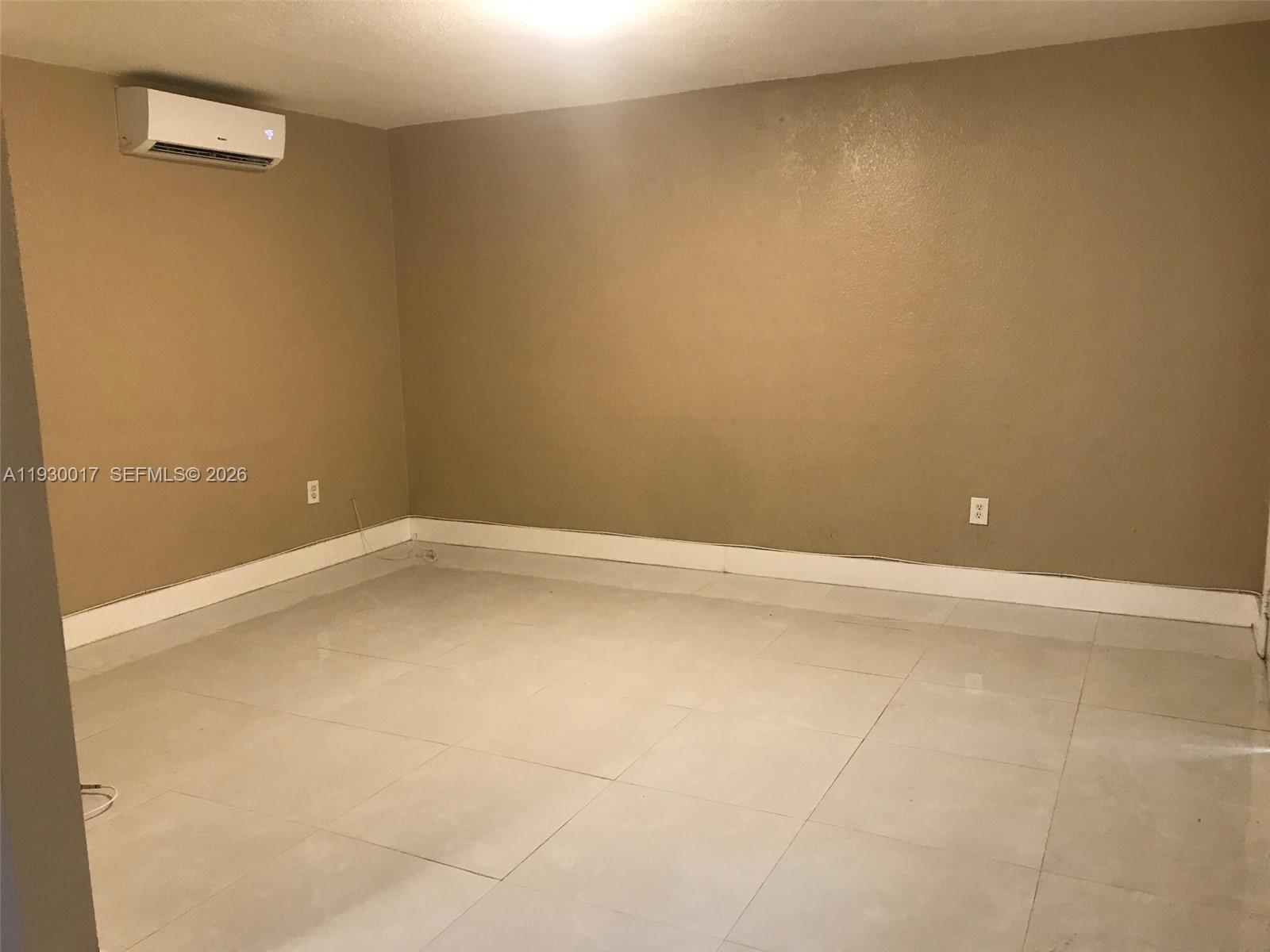 4550 Southwest 67th Avenue, Unit 7 Miami, FL 33155 - Photo 9 of 25 a view of an empty room