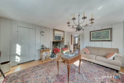 59 Hidden Lake Road Haddam, CT 06441 - Photo 17 of 40 The right front parlor with fireplace & bake oven !