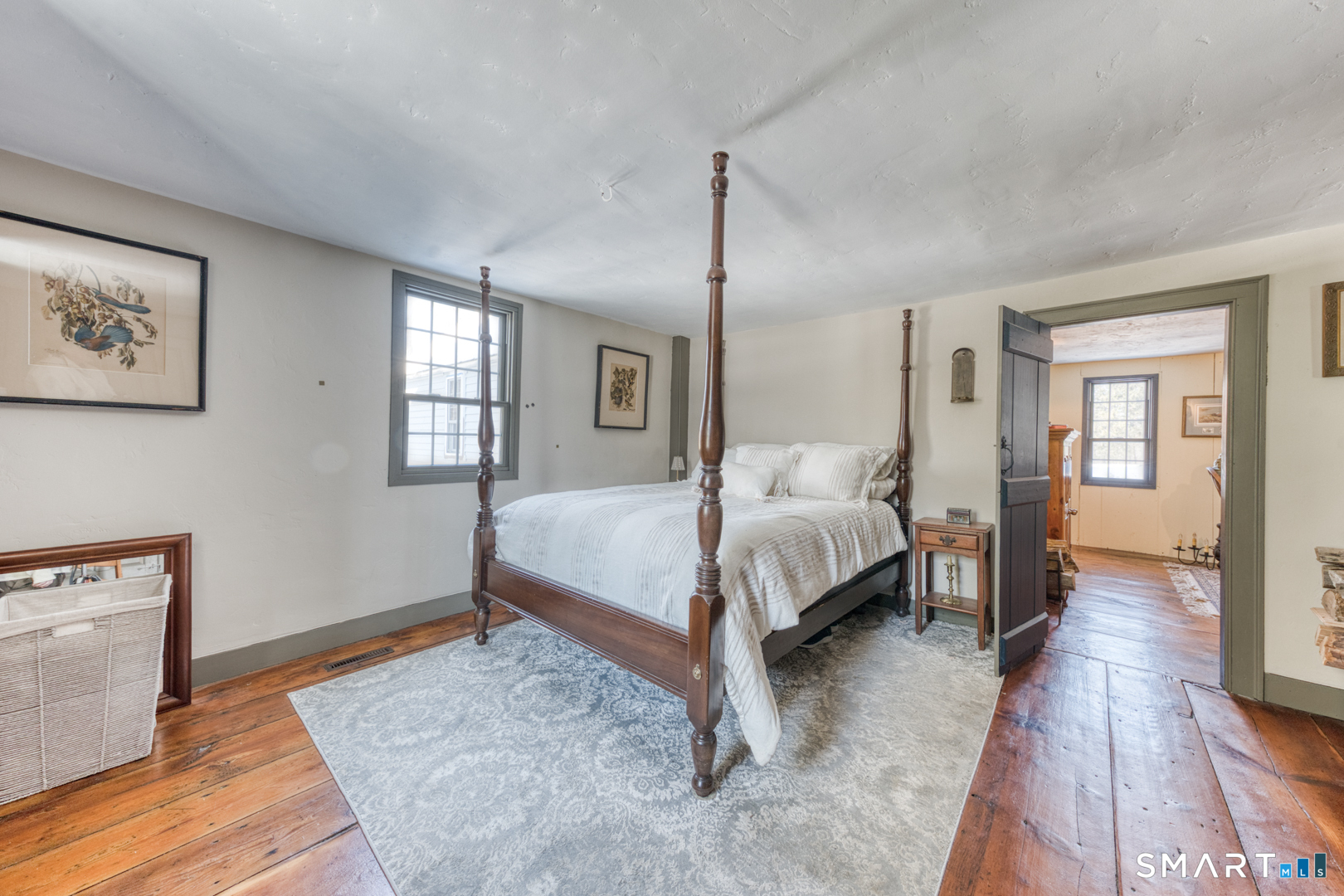 59 Hidden Lake Road Haddam, CT 06441 - Photo 21 of 40 This left front parlor with fireplace is presently used as a fourth bedroom (bed chamber) !