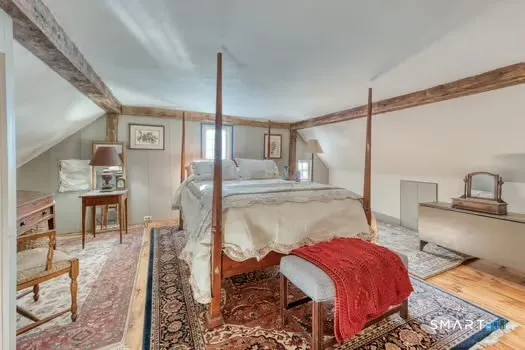 a en suite bathroom with a sink and mirror
