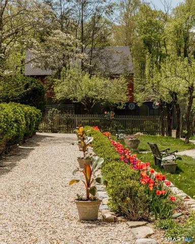 a view of a lake with sitting area and entertaining space