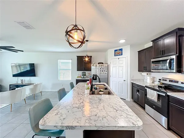 $373,000 | 3180 Burrowing Owl Drive, Mims, FL 32754