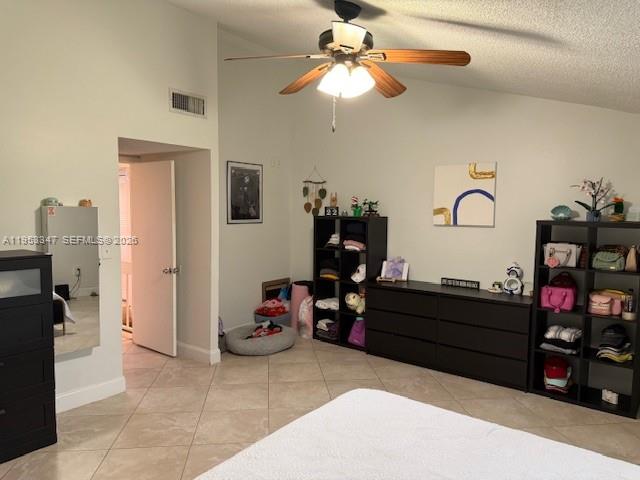 8401 West Sample Road, Unit 14 Coral Springs, FL 33065 - Photo 16 of 32 a bed room with a bed and a mirror