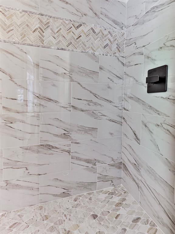 633 Butterworth Road Canton, GA 30114 - Photo 36 of 55 a bathroom with a shower