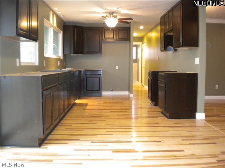 308 Barrington Ridge Road Painesville, OH 44077 - Photo 4 of 14 Chef's Kitchen with ample cabinets and granite counter tops!