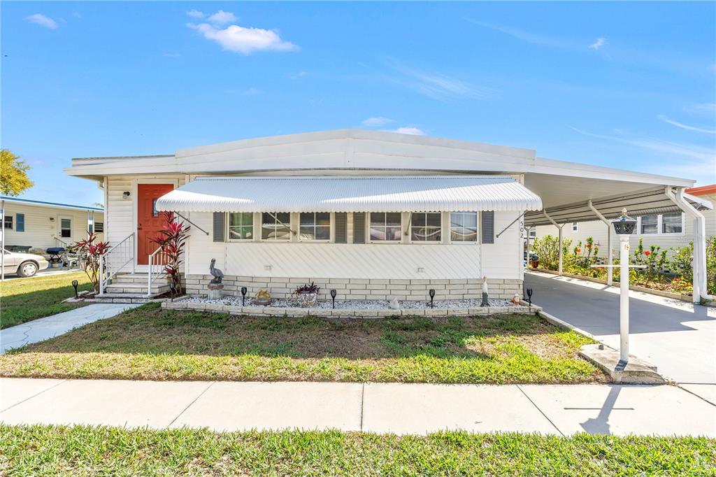 1100 South Belcher Road, Unit 502 Largo, FL 33771 - Photo 2 of 51 a view of a house with a swimming pool