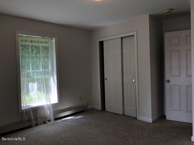 525 W Road Clarksburg, MA 01247 - Photo 11 of 23 an empty room with windows