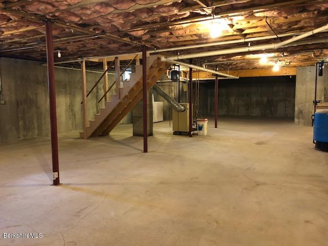 525 W Road Clarksburg, MA 01247 - Photo 14 of 23 a view of an empty room with stairs