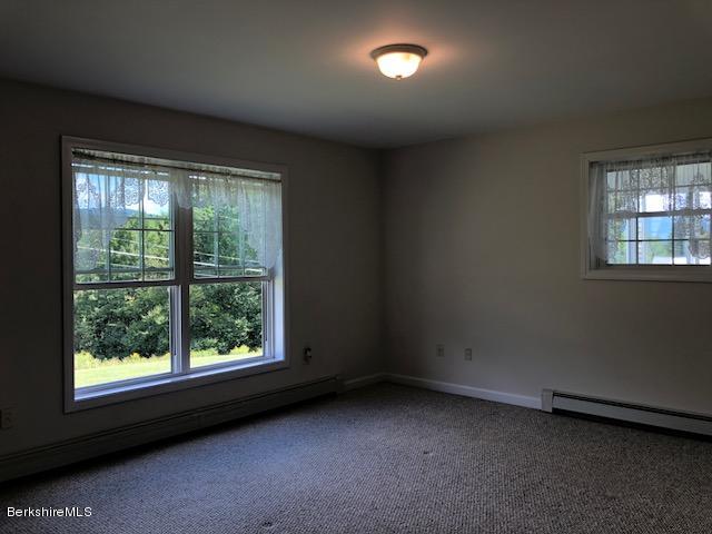 525 W Road Clarksburg, MA 01247 - Photo 10 of 23 an empty room with a window