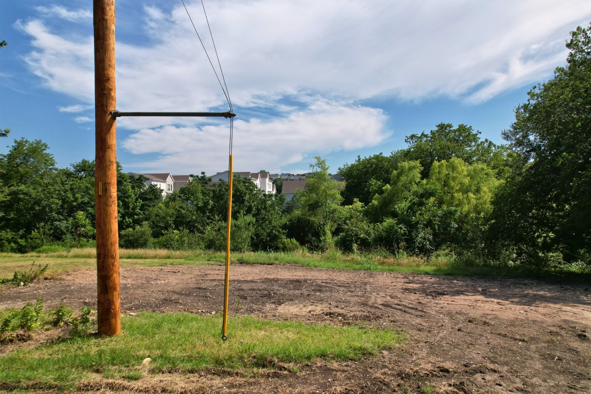 2610-2606 Metcalfe Road Austin, TX 78741 - Photo 8 of 20 A spacious lot provides ample opportunity for construction amidst natural surroundings and distant residences.