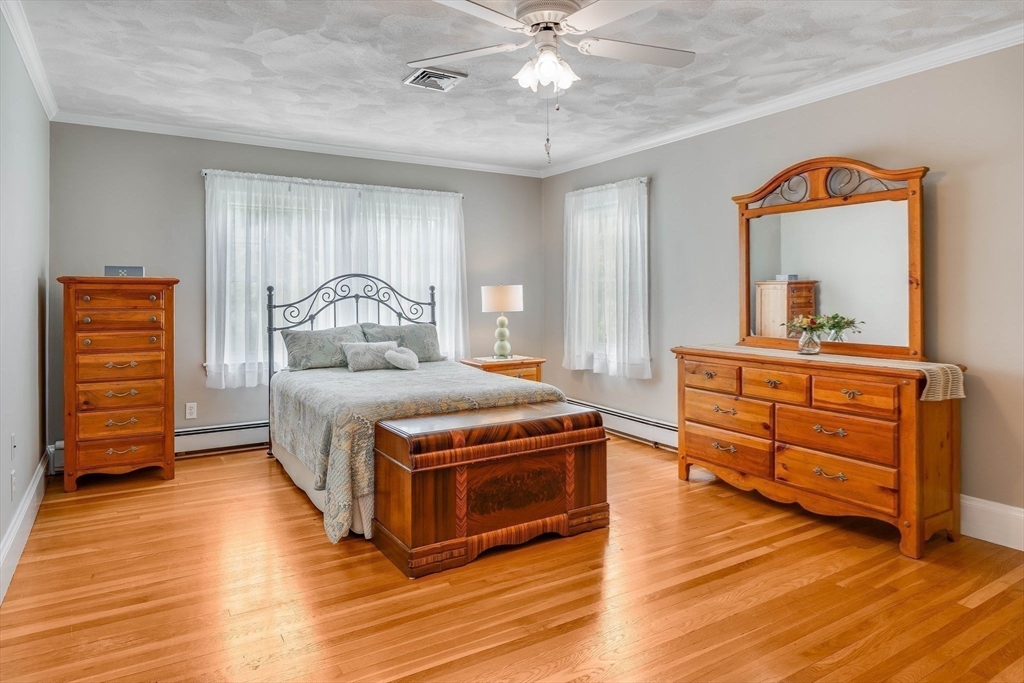 223 Lawrence Road Medford, MA 02155 - Photo 19 of 40 a living room with furniture and wooden floor