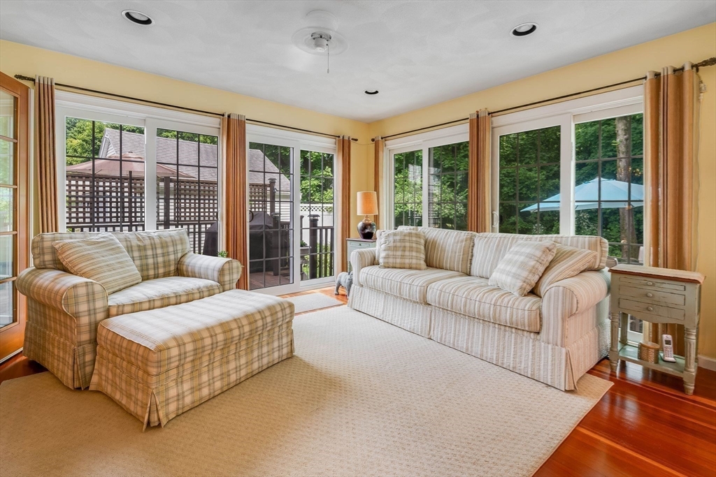223 Lawrence Road Medford, MA 02155 - Photo 9 of 40 a living room with furniture and windows