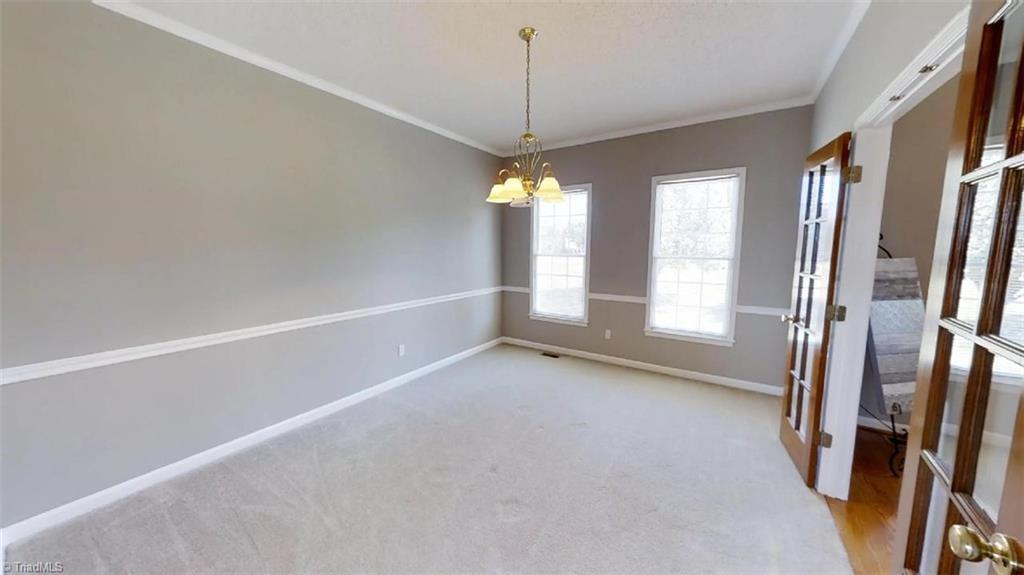 1511 Enterprise Road Lexington, NC 27295 - Photo 6 of 26 Solid wood french doors in the formal dining room.