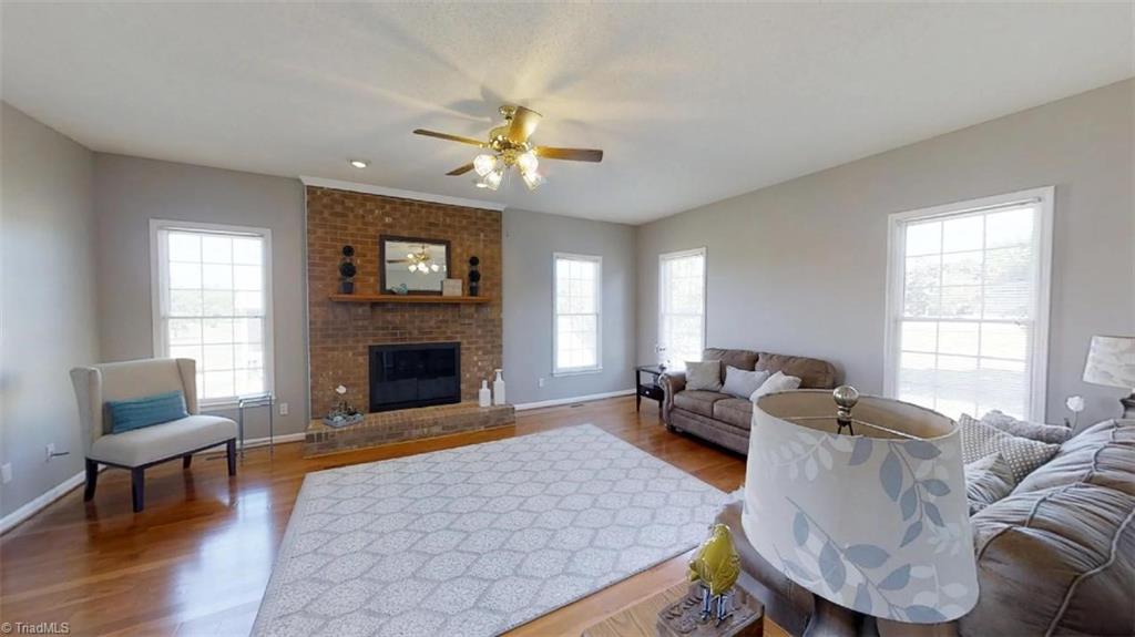 1511 Enterprise Road Lexington, NC 27295 - Photo 10 of 26 Cozy fireplace in the living room.