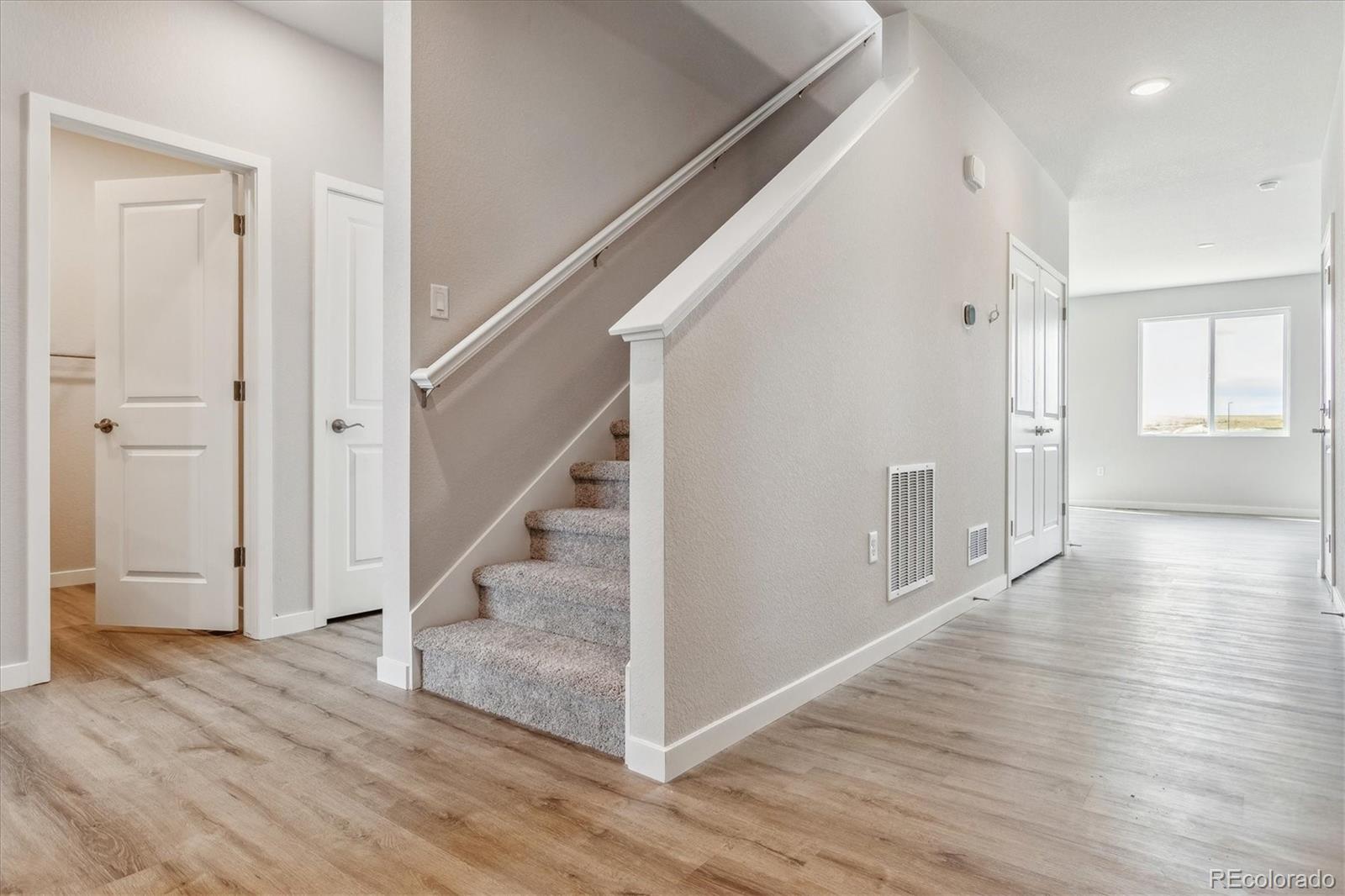 4255 Gozzer Ranch Drive Elizabeth, CO 80107 - Photo 7 of 21 a view of entryway with wooden floor