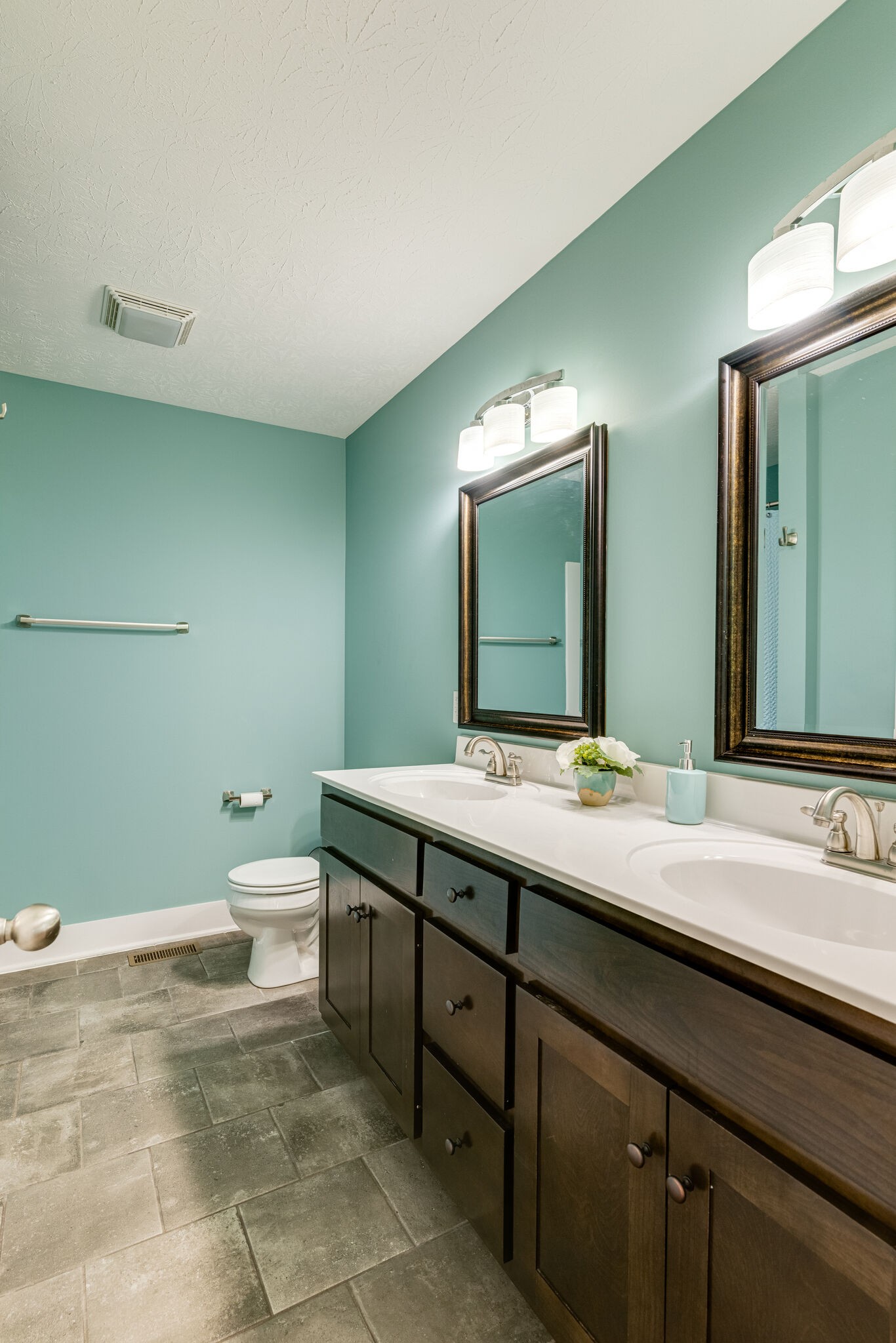 1688 Rock Bridge Road Bethpage, TN 37022 - Photo 20 of 29 a bathroom with a double vanity sink and a mirror