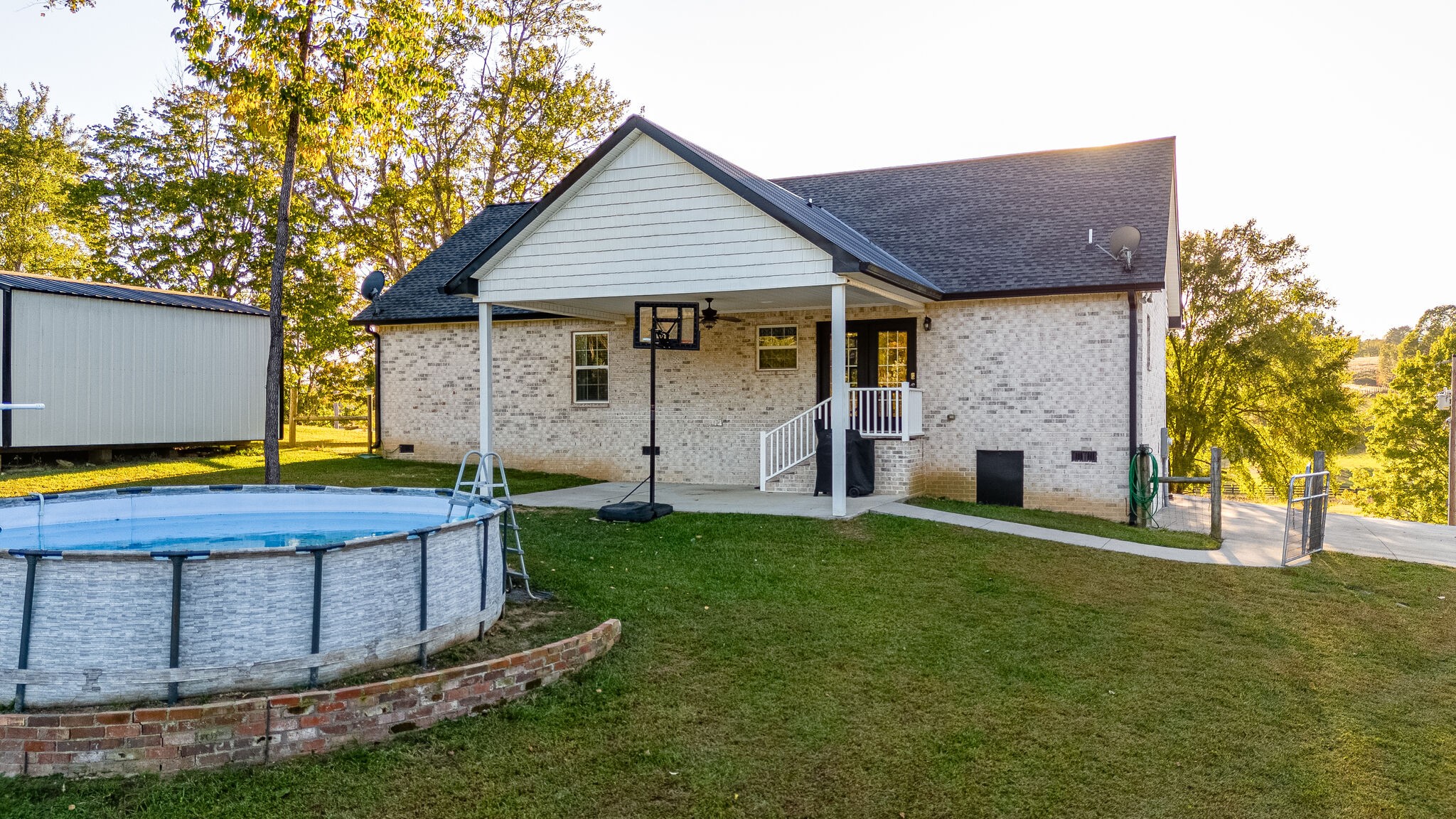 1688 Rock Bridge Road Bethpage, TN 37022 - Photo 27 of 29 a view of a house with a yard and a large tree