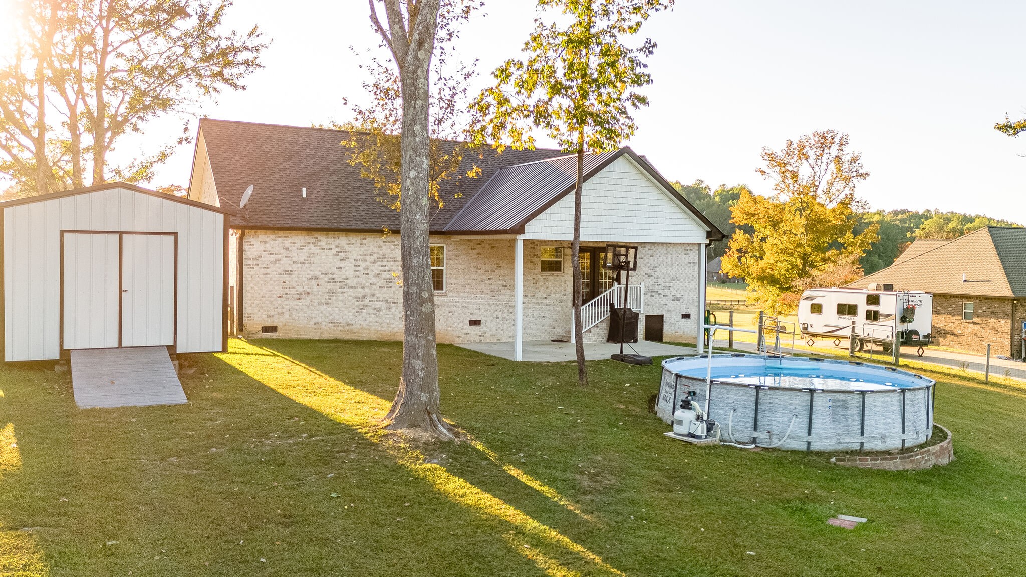 1688 Rock Bridge Road Bethpage, TN 37022 - Photo 28 of 29 a view of a house with swimming pool and porch