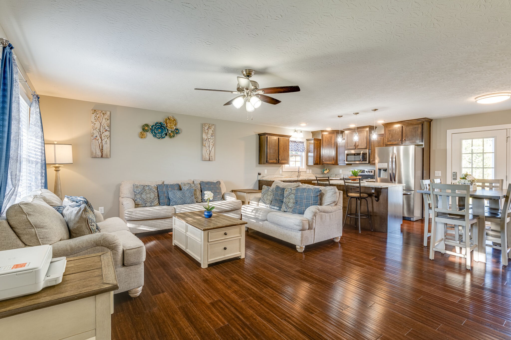 1688 Rock Bridge Road Bethpage, TN 37022 - Photo 5 of 29 a living room with furniture kitchen view and a wooden floor