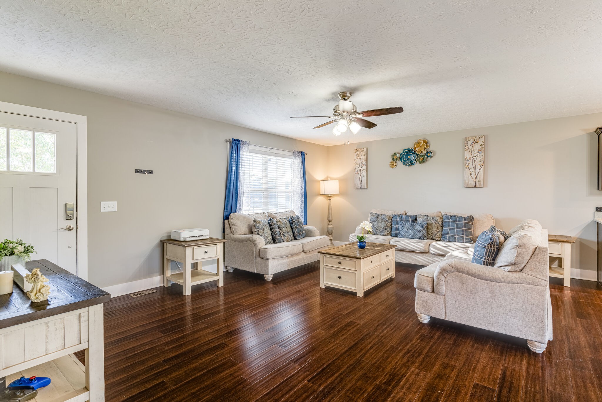 1688 Rock Bridge Road Bethpage, TN 37022 - Photo 6 of 29 a living room with furniture and a wooden floor