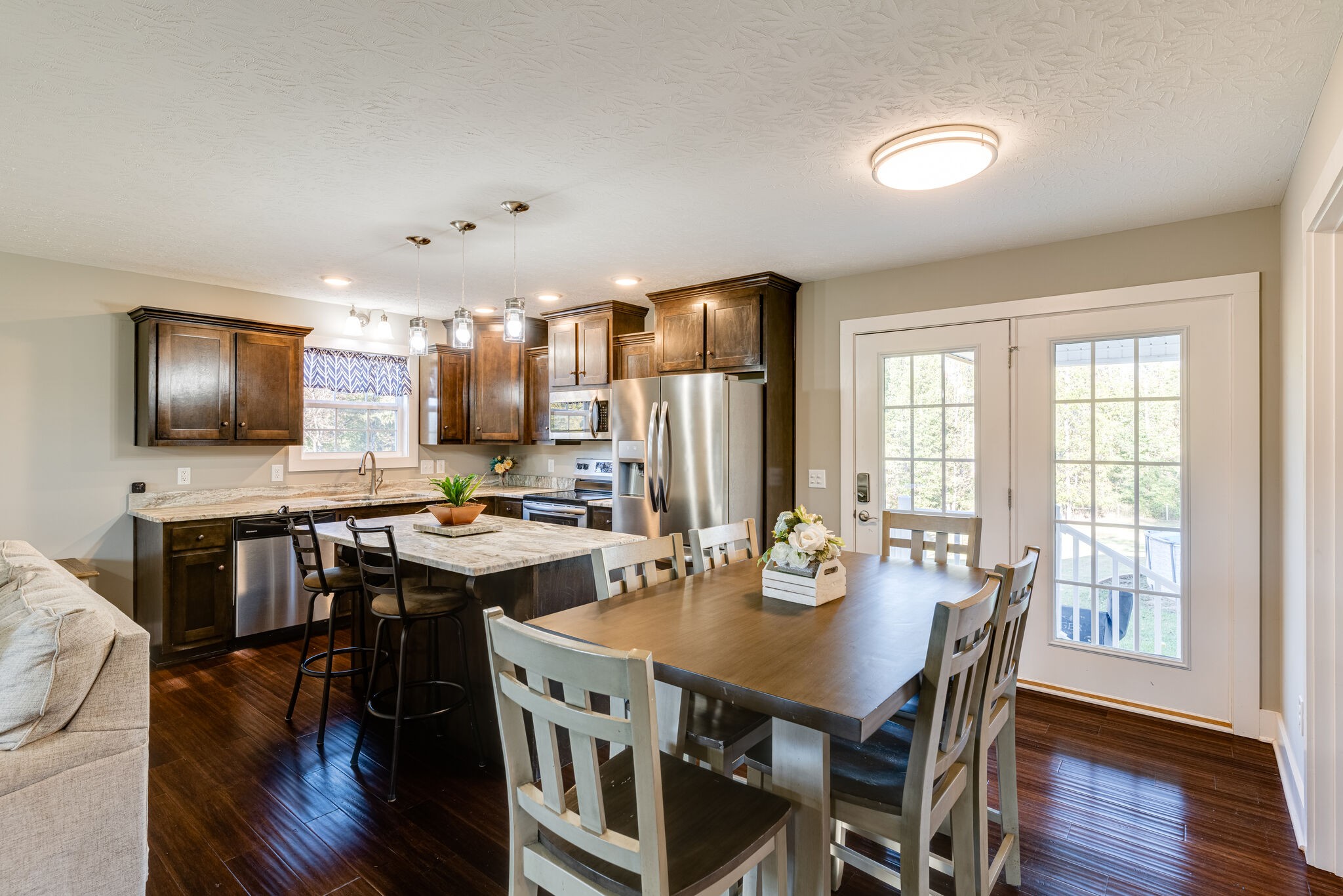 1688 Rock Bridge Road Bethpage, TN 37022 - Photo 8 of 29 a view of a dining room with furniture window and wooden floor