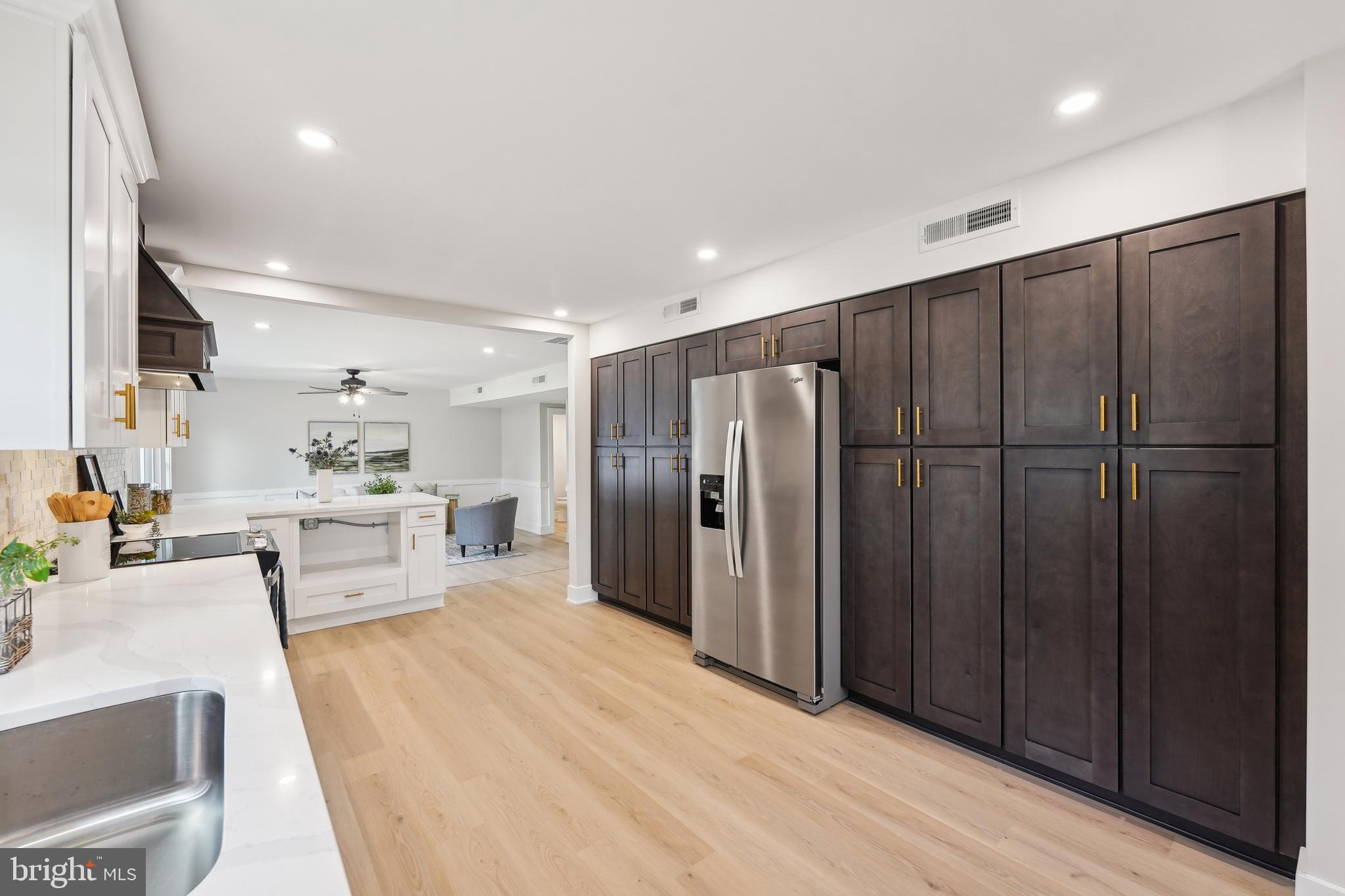 44 Concord Road Marlton, NJ 08053 - Photo 14 of 43 a large white kitchen with a refrigerator a sink and cabinets