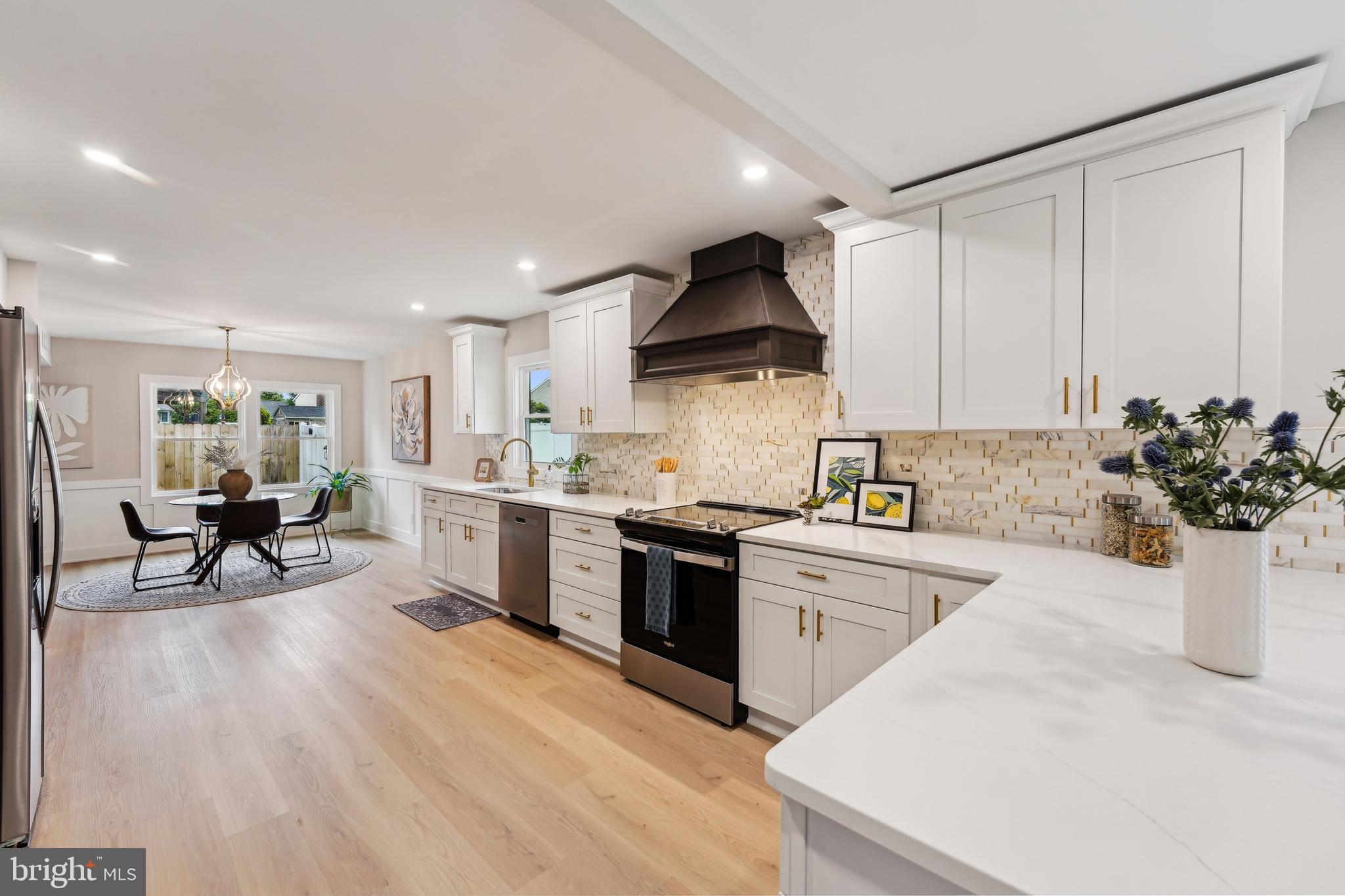 44 Concord Road Marlton, NJ 08053 - Photo 15 of 43 a kitchen with a white wooden cabinets and white appliances