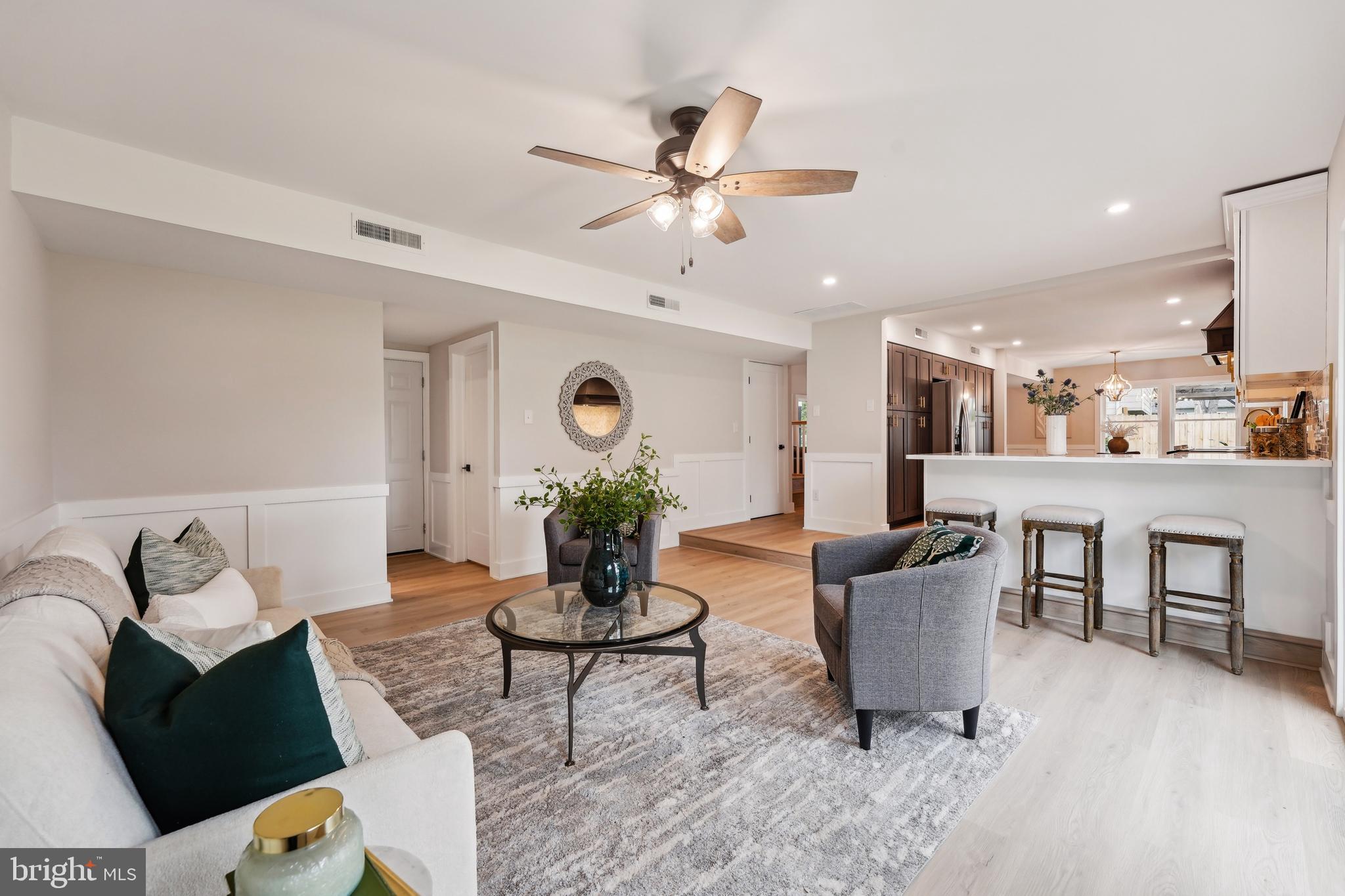 44 Concord Road Marlton, NJ 08053 - Photo 17 of 43 a living room with furniture and a clock