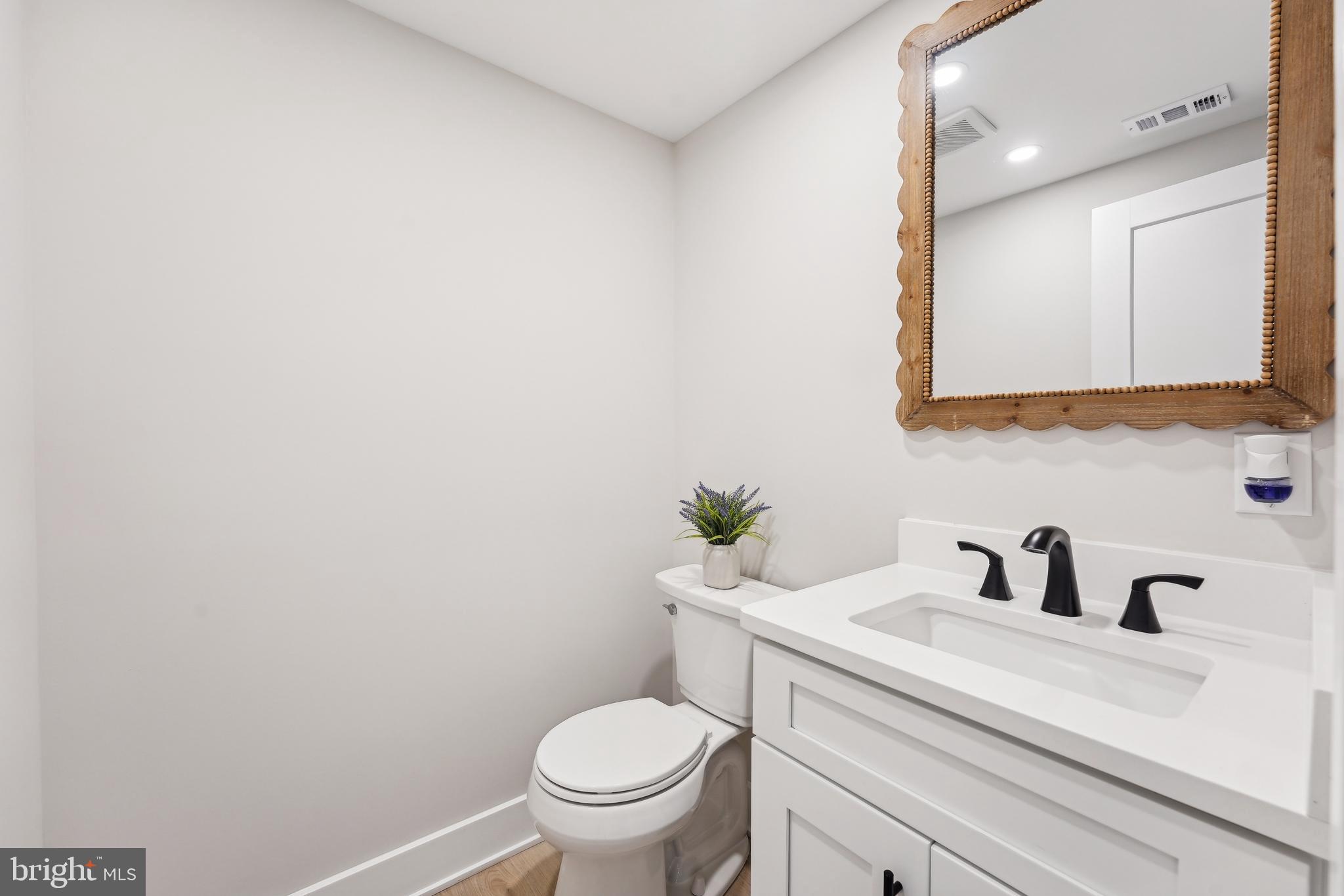 44 Concord Road Marlton, NJ 08053 - Photo 20 of 43 a bathroom with a granite countertop toilet sink and mirror