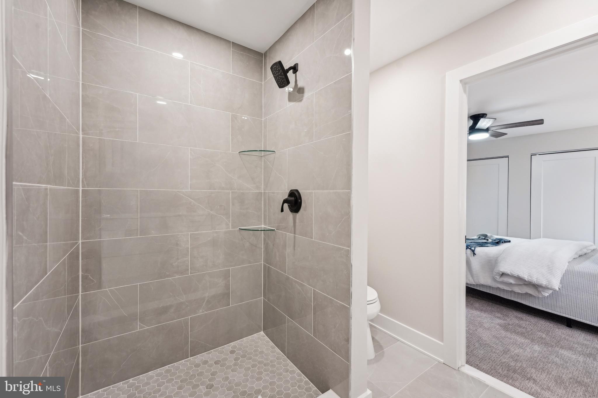 44 Concord Road Marlton, NJ 08053 - Photo 29 of 43 a bathroom with a sink a toilet and shower