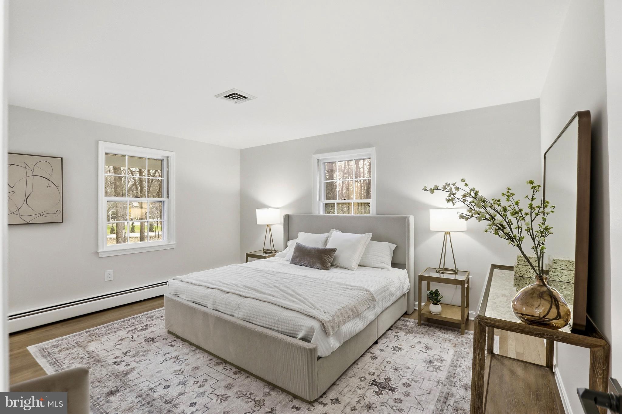 11328 Vale Road Oakton, VA 22124 - Photo 13 of 34 a bedroom with a bed and a window