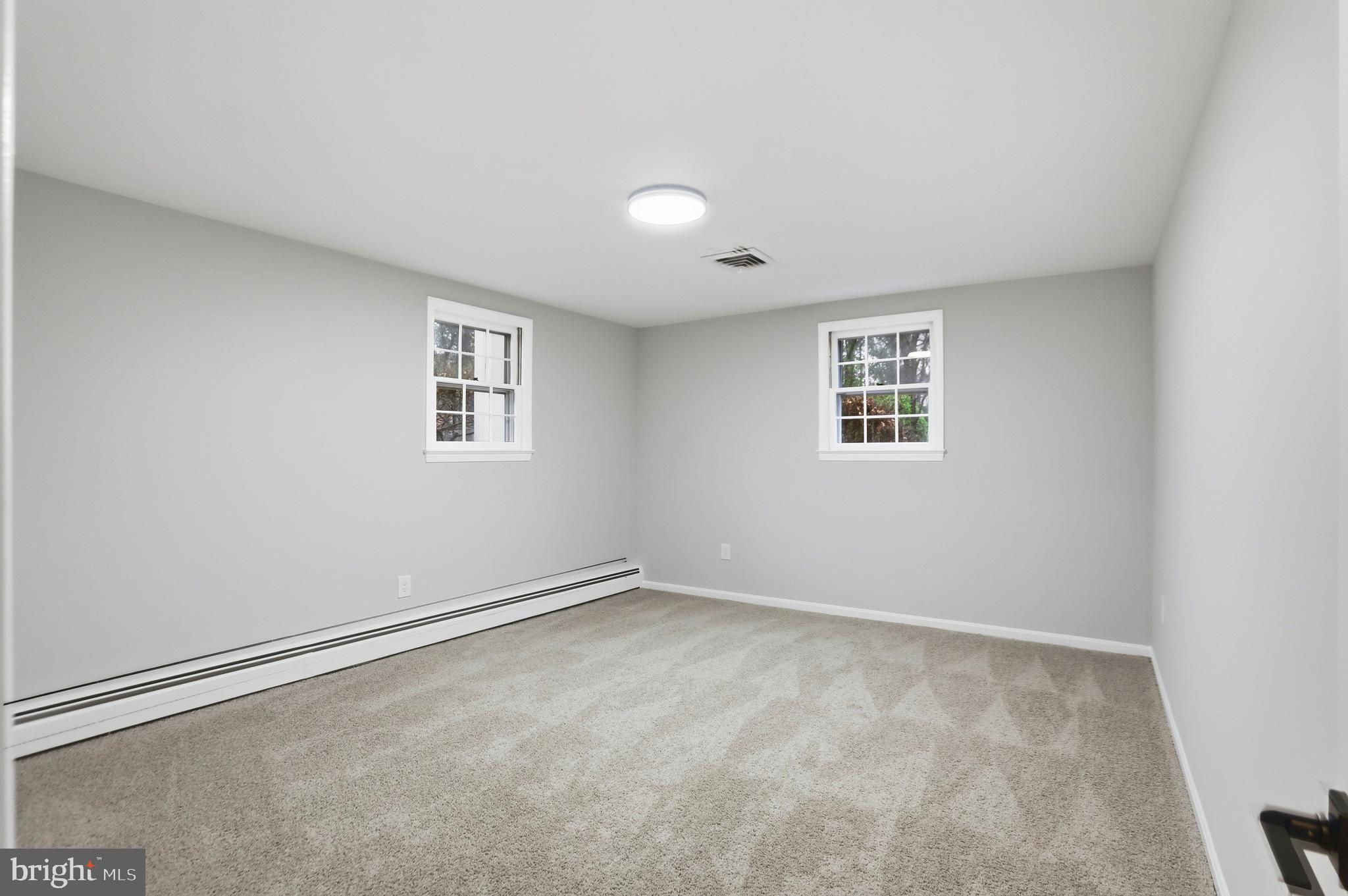 11328 Vale Road Oakton, VA 22124 - Photo 25 of 34 an empty room with a window