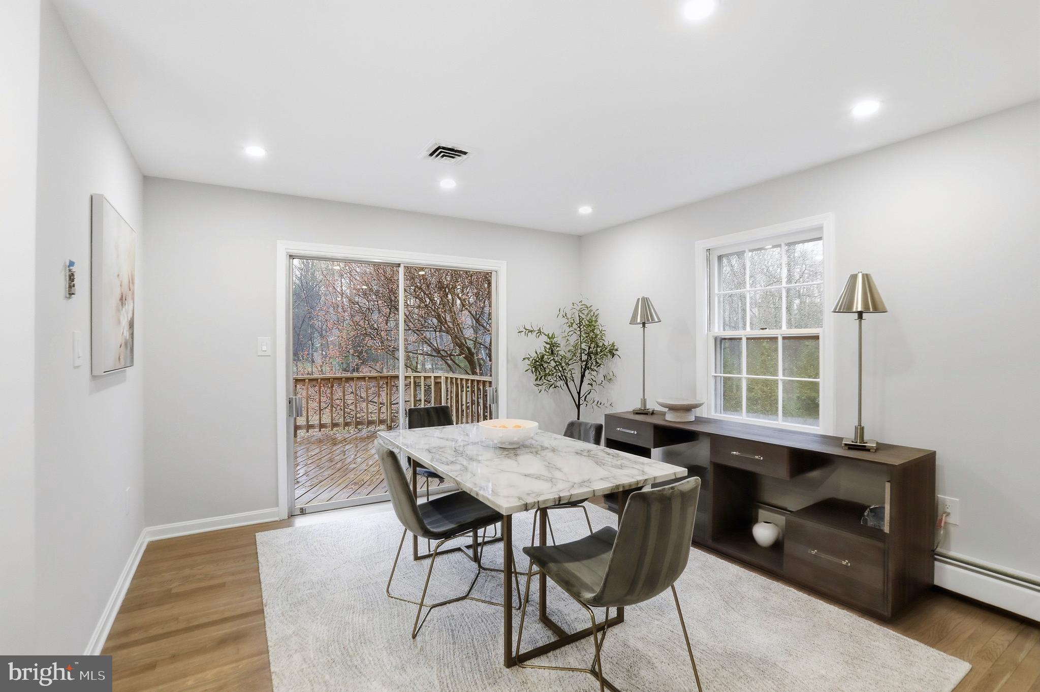 11328 Vale Road Oakton, VA 22124 - Photo 6 of 34 a view of a dining room with furniture window and outside view