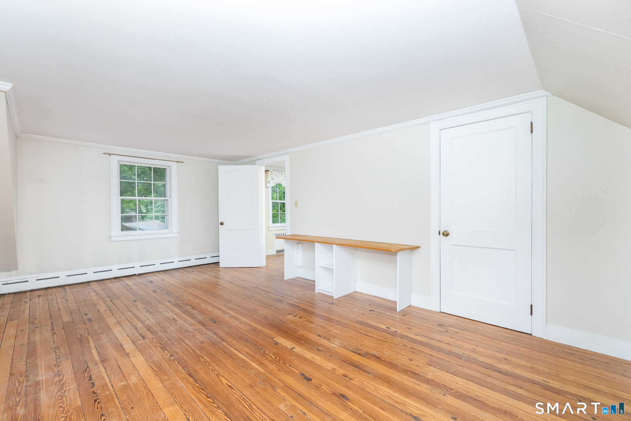 6 Keighley Pond Road East Hampton, CT 06456 - Photo 23 of 40 This bedroom features a built-in desk, 9 built-in drawers, and a closet.