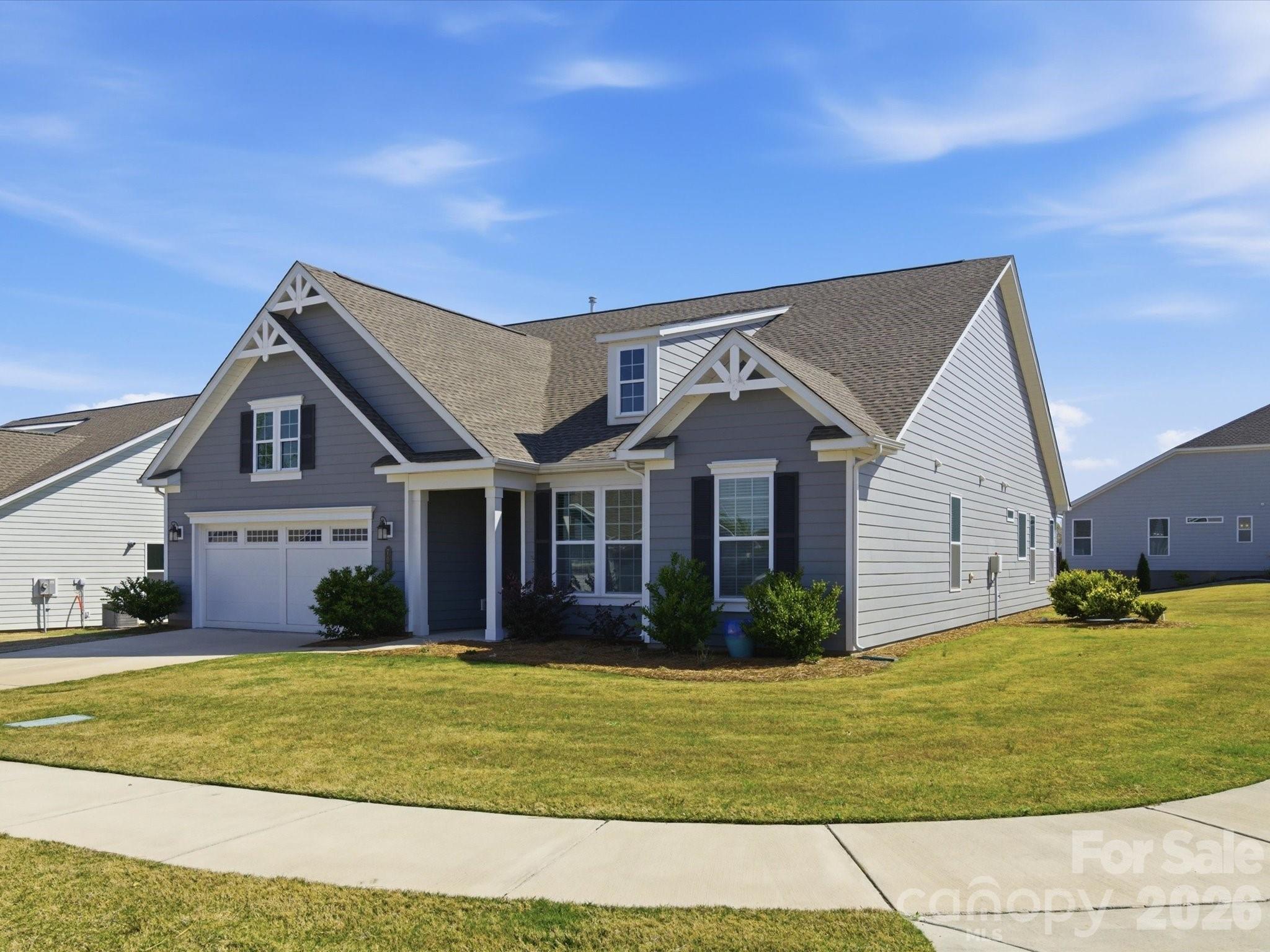 7004 Treetop Court York, SC 29745 - Photo 3 of 47 a front view of a house with a yard