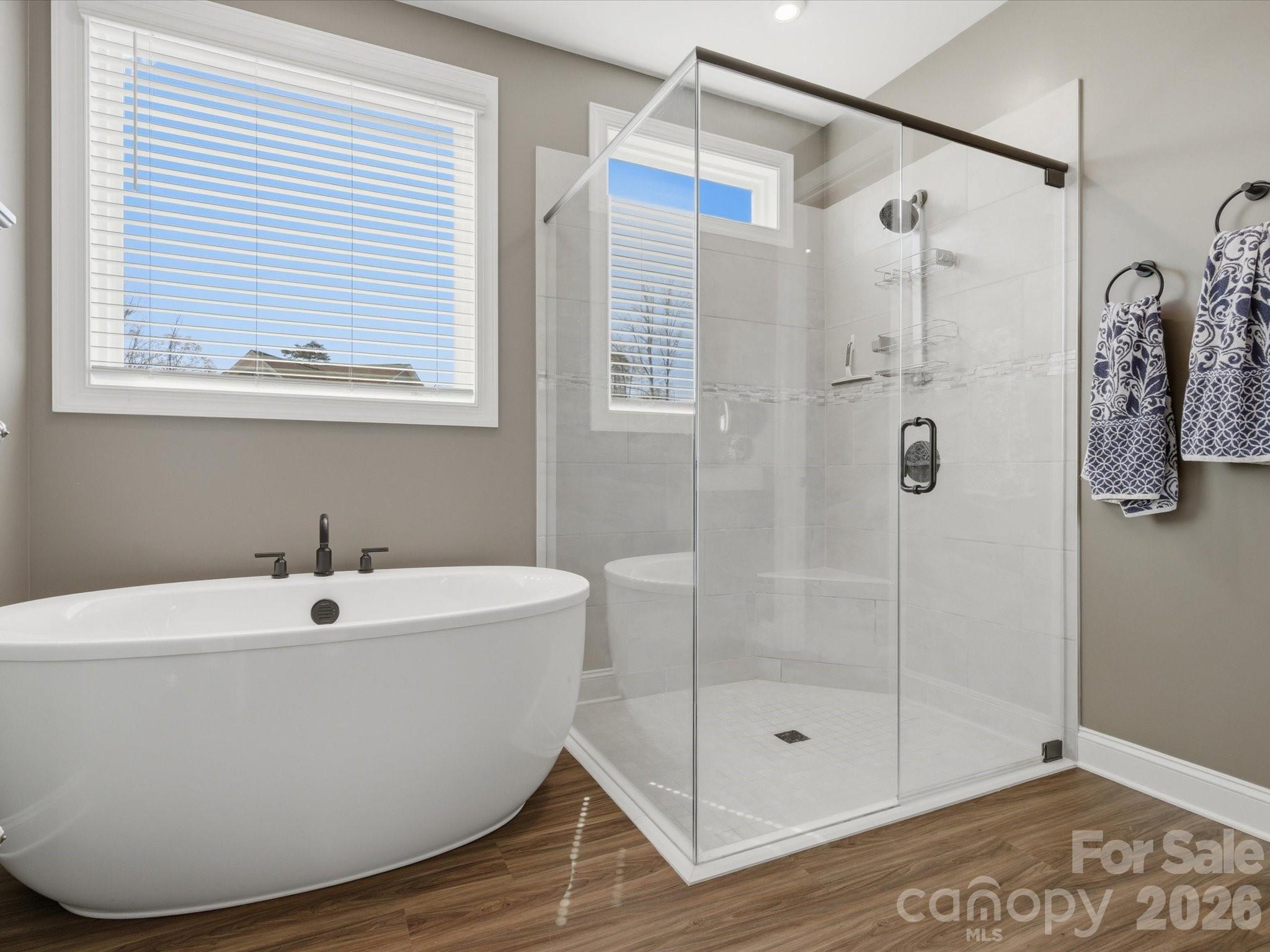 7004 Treetop Court York, SC 29745 - Photo 43 of 47 a white bath tub sitting next to a shower