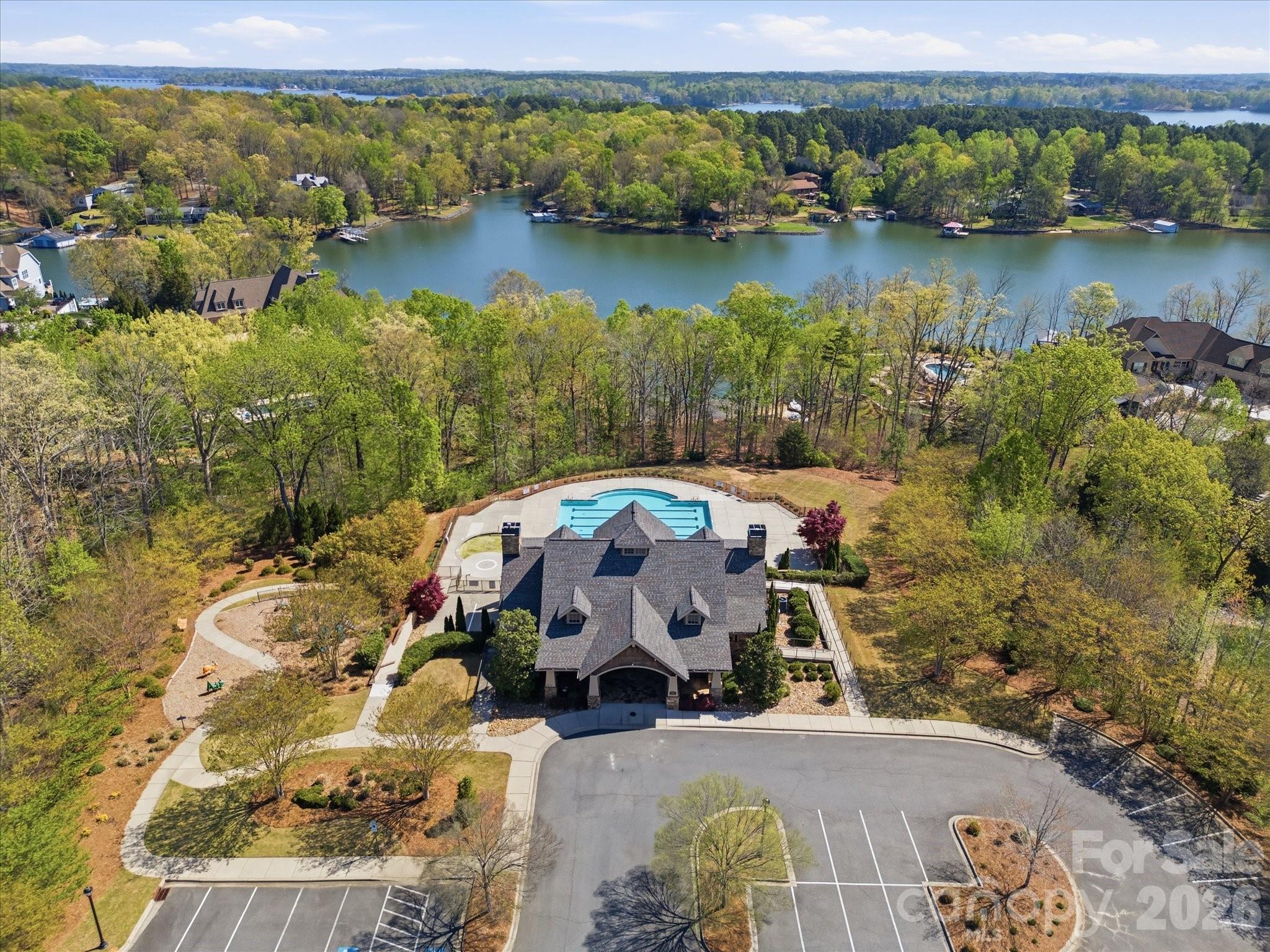 7004 Treetop Court York, SC 29745 - Photo 45 of 47 an aerial view of a house with garden space and lake view