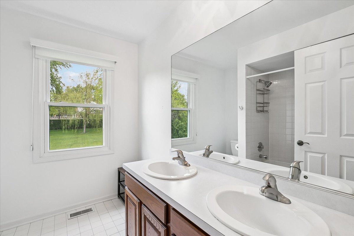 250 Wilshire Road Lake Forest, IL 60045 - Photo 18 of 28 a bathroom with a sink and a window