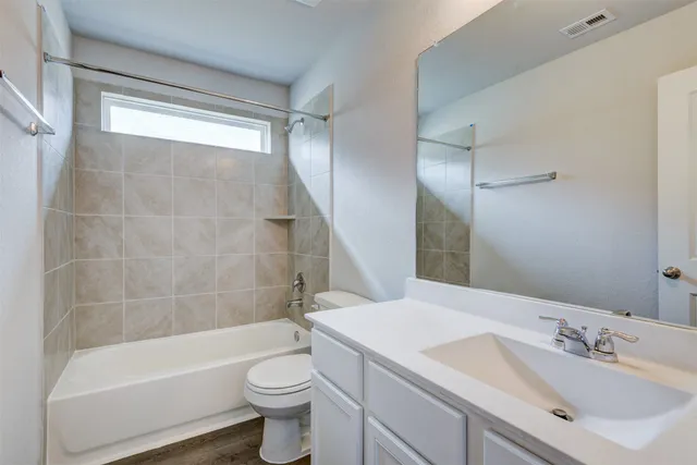 a house view with a garden space