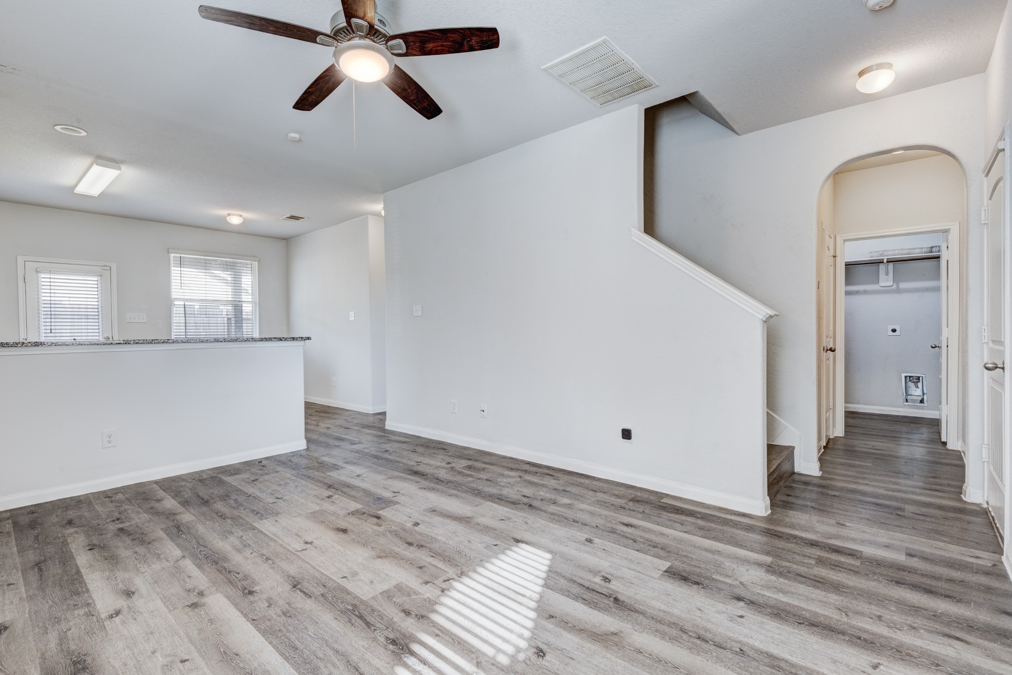 5011 Blue Jacaranda Way Spring Spring, TX 77373 - Photo 9 of 32 a view of empty room with wooden floor