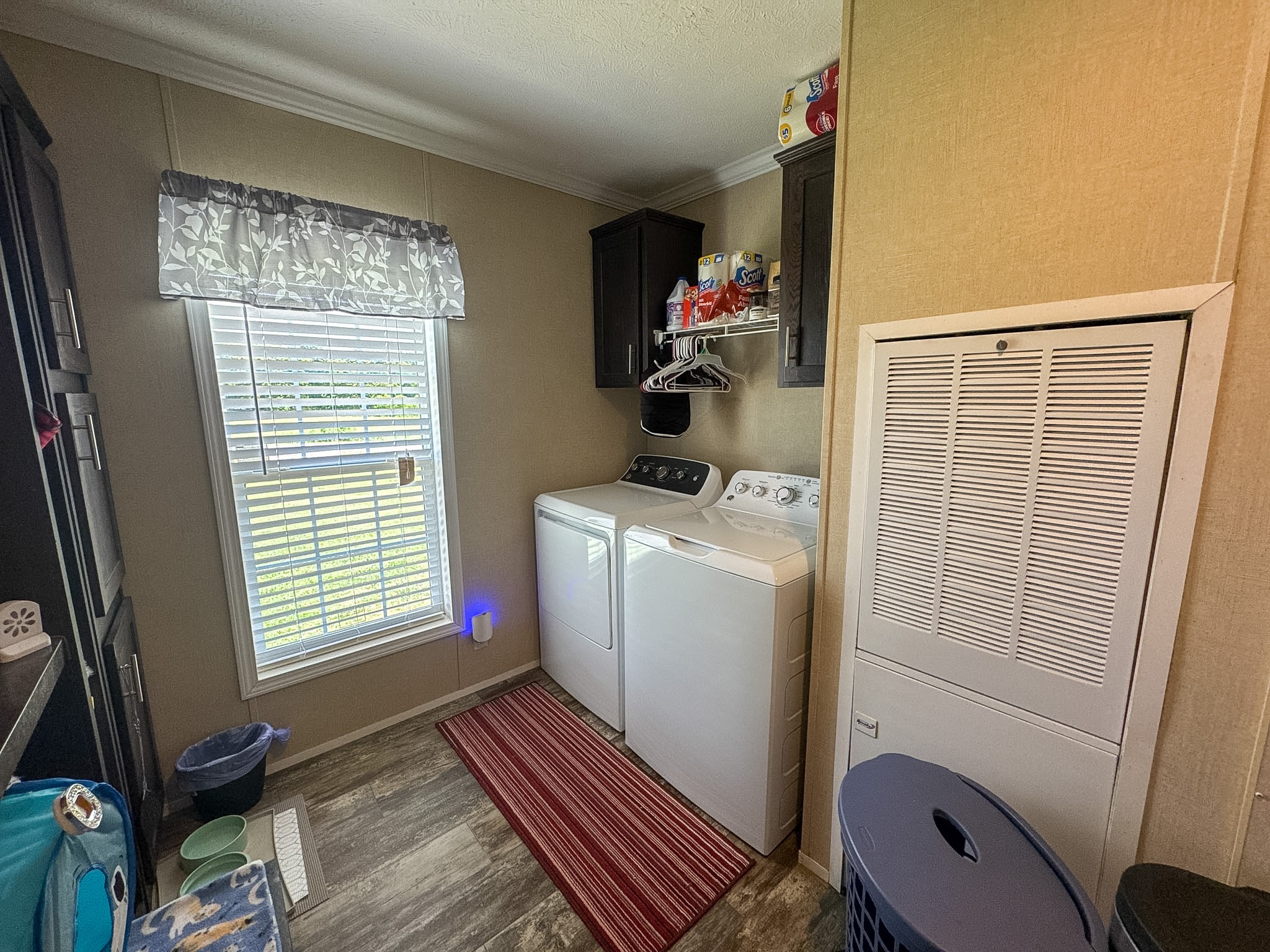 1198 David Patterson Road Lutts, TN 38471 - Photo 29 of 82 a storage room with wooden floor washer and dryer