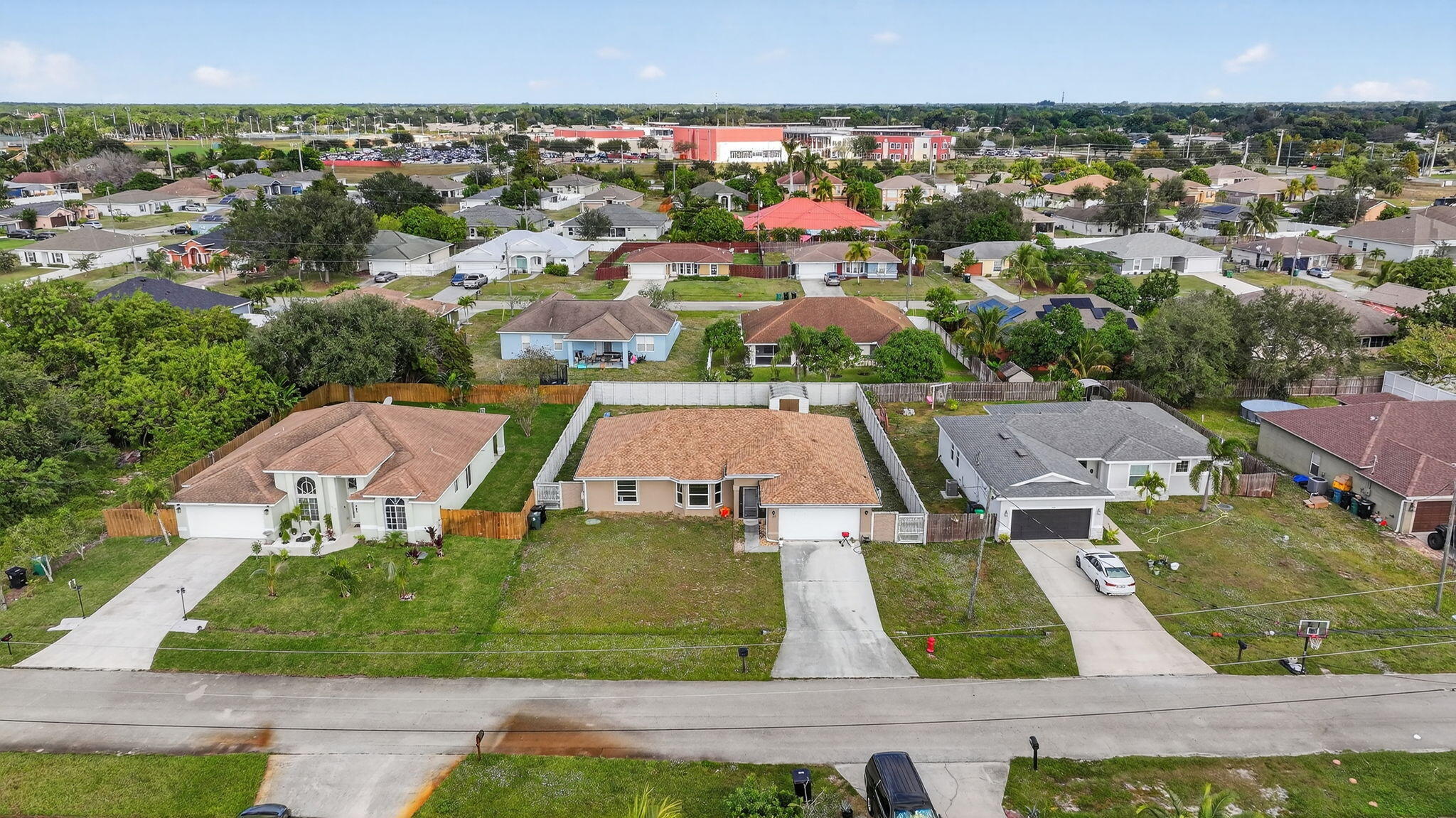 557 Southwest Halkell Avenue Port St. Lucie, FL 34953 - Photo 35 of 36 49-web-or-mls-DJI_20251114021039_0086_D