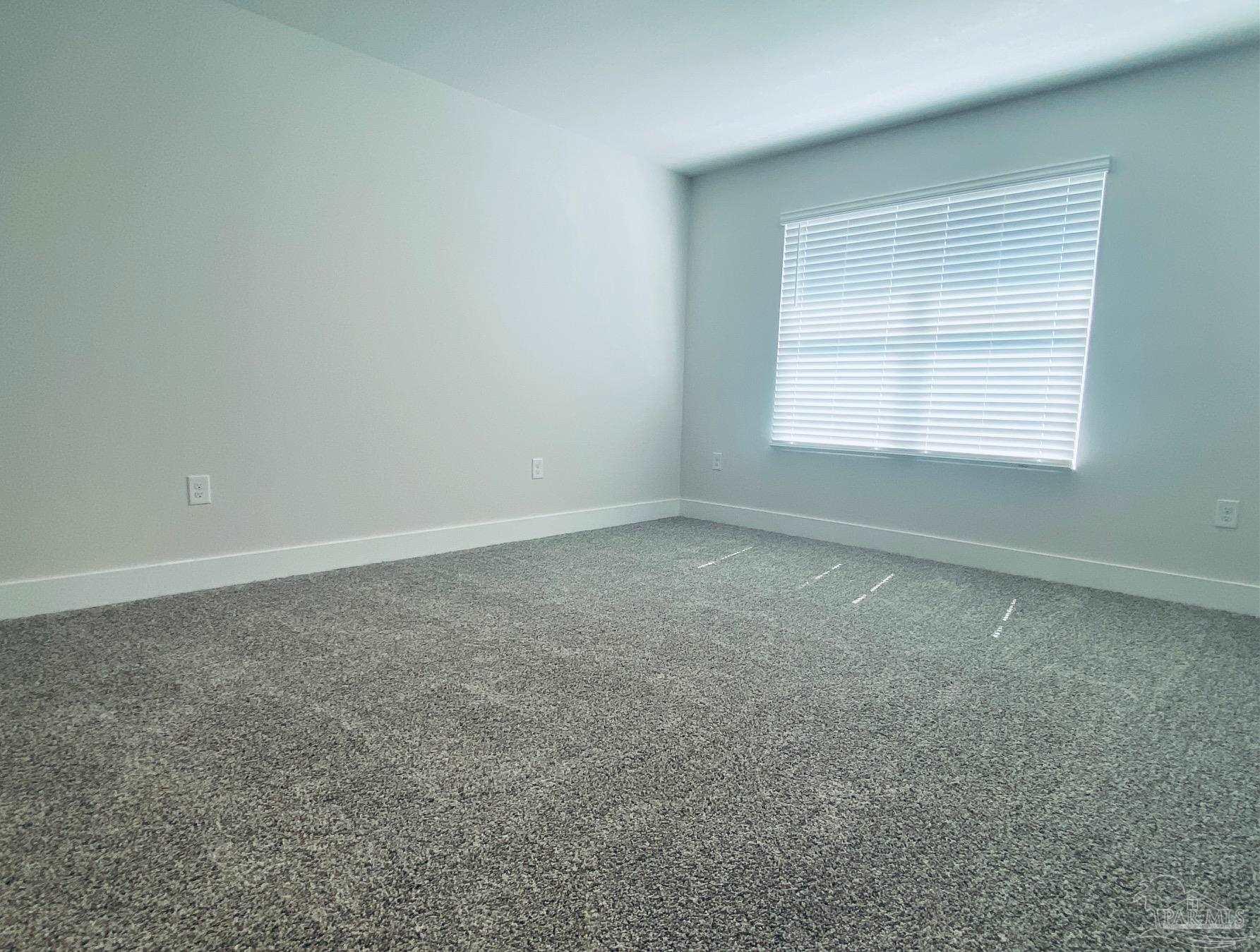 3021 Serviceberry Road Cantonment, FL 32533 - Photo 8 of 21 an empty room with a window