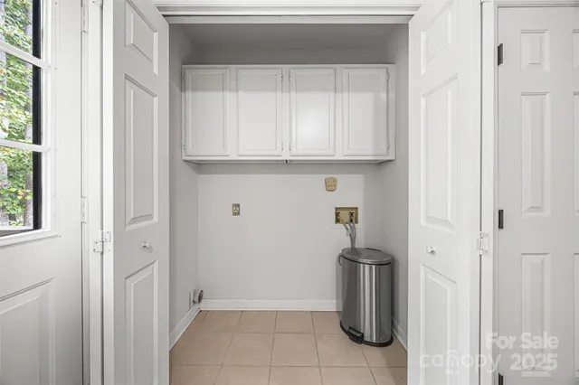 a kitchen with a sink and dishwasher