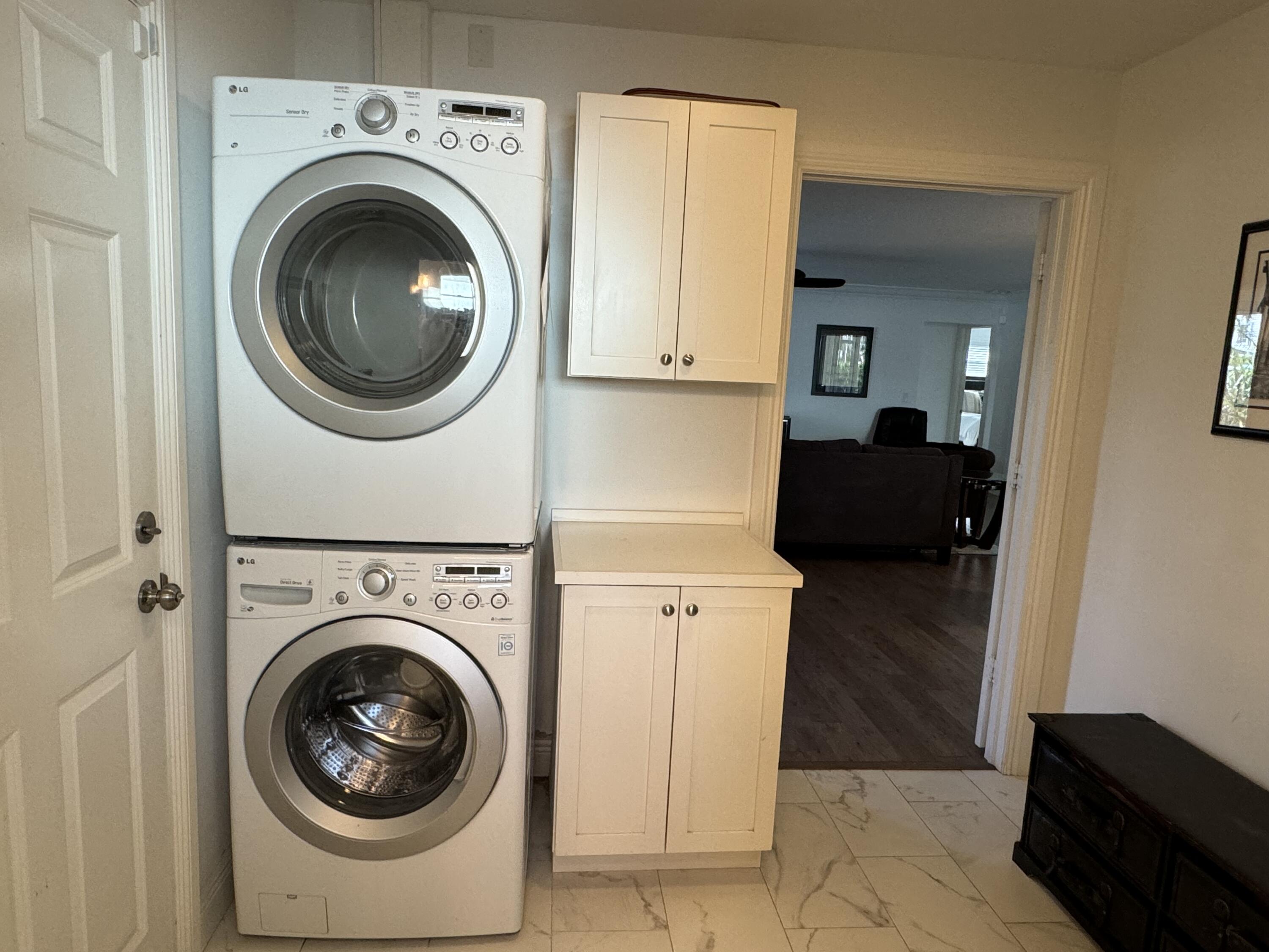 954 Marlin Circle Jupiter, FL 33458 - Photo 14 of 22 a view of a storage & utility room with washer and dryer