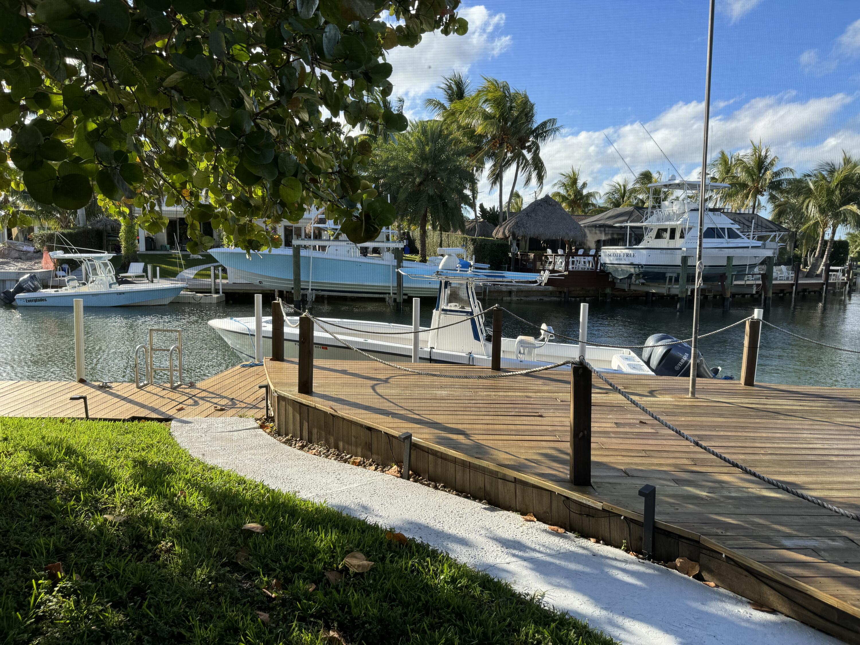 954 Marlin Circle Jupiter, FL 33458 - Photo 19 of 22 a view of a lake with houses