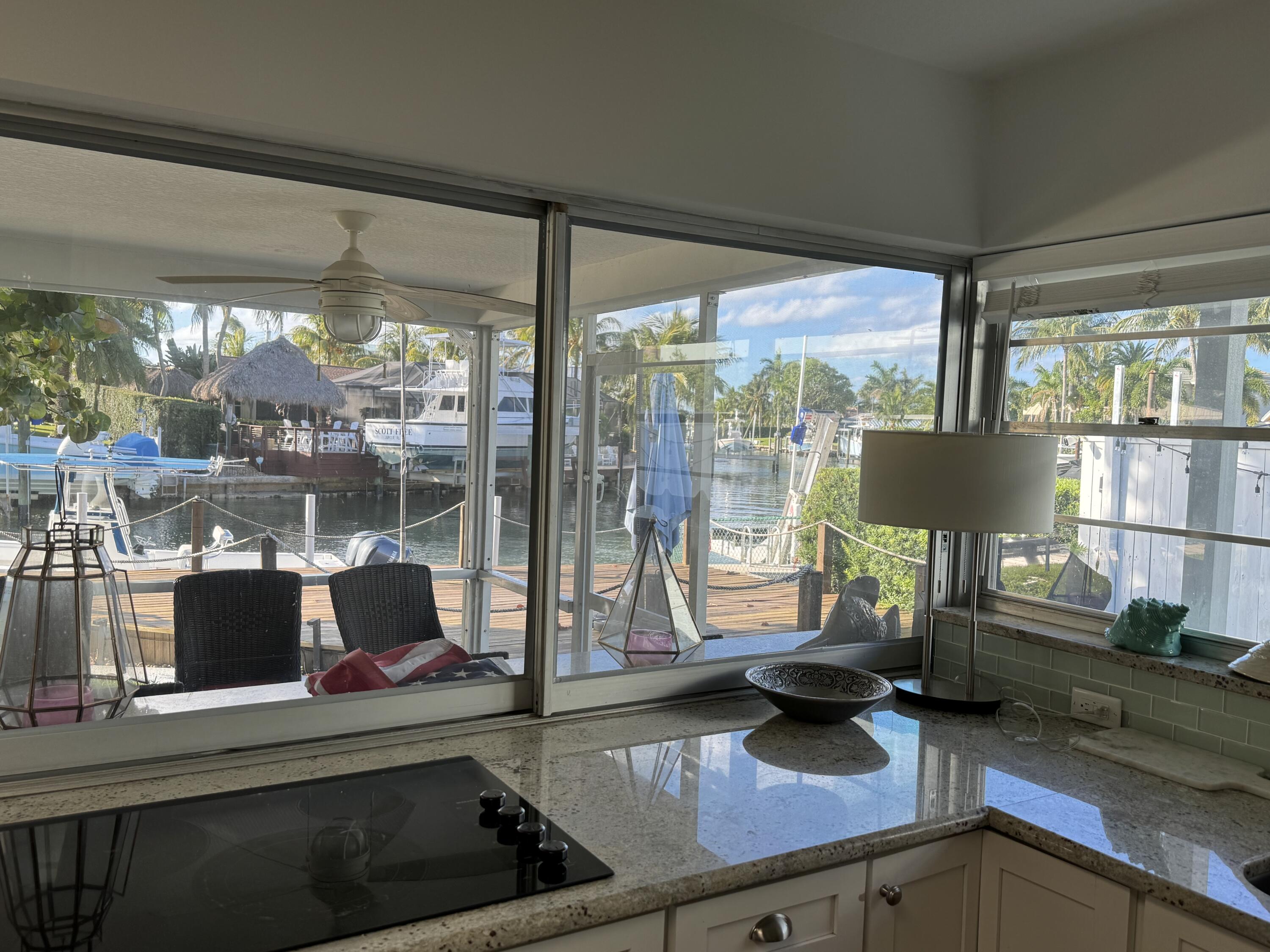 954 Marlin Circle Jupiter, FL 33458 - Photo 4 of 22 a room with furniture and a large window