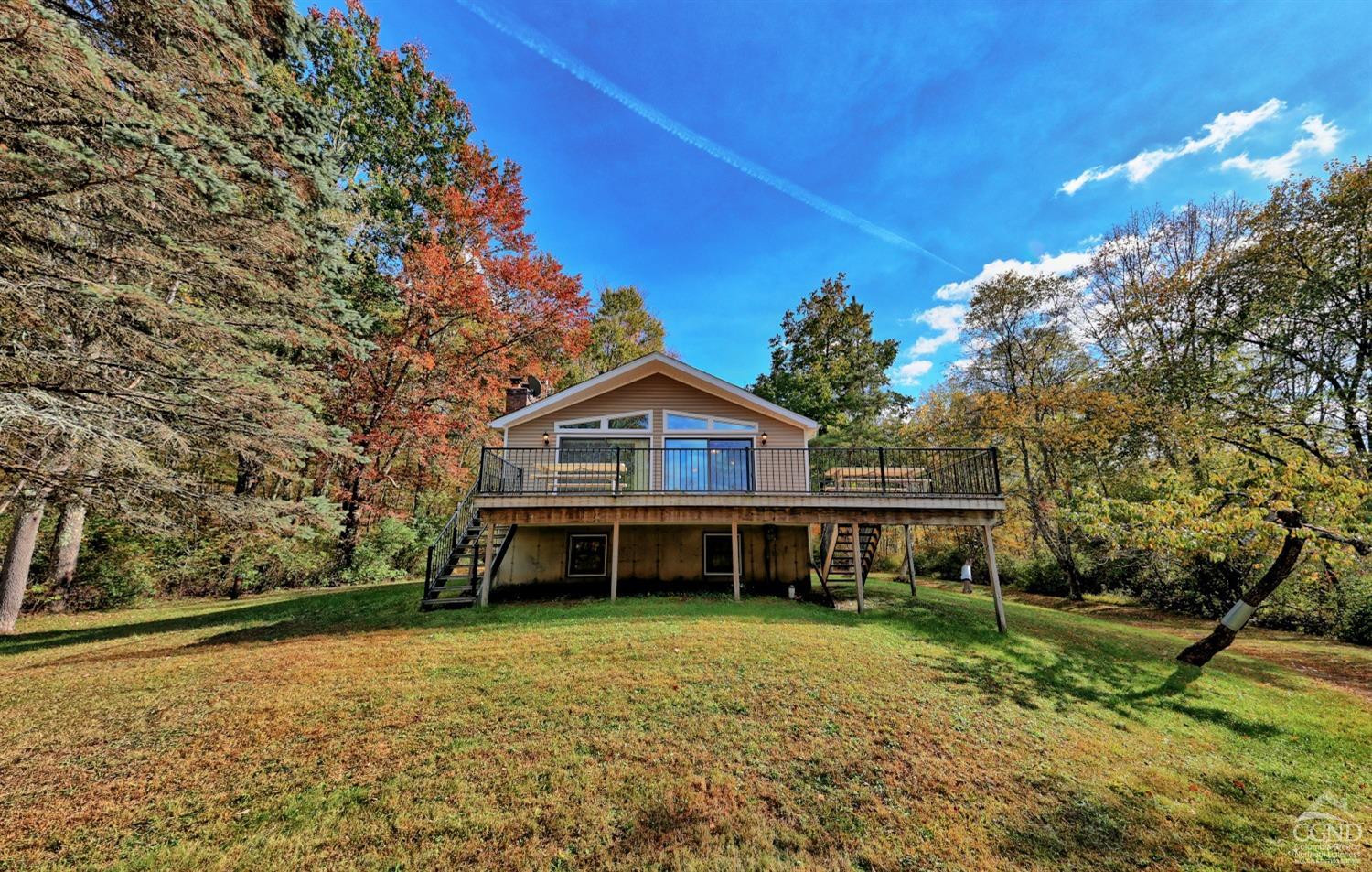496 New Forge Road Ancram, NY 12502 - Photo 3 of 87 a front view of a house with a yard